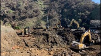 Excavators removing debris from the canyon February 11