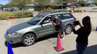 Librarian Angelica Fortin personally thanked all the volunteers who drove through the parking lot.