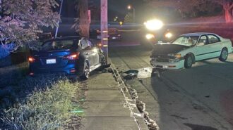 Driver crashes into parked car