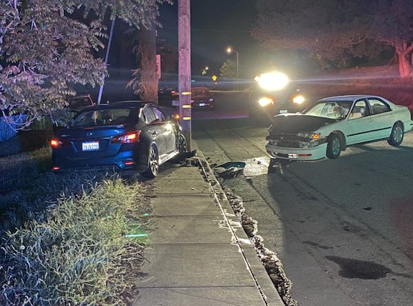 Driver crashes into parked car