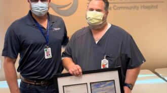 Tenet Heroes Honoree CNO Robert Cook with CEO Mark Lisa