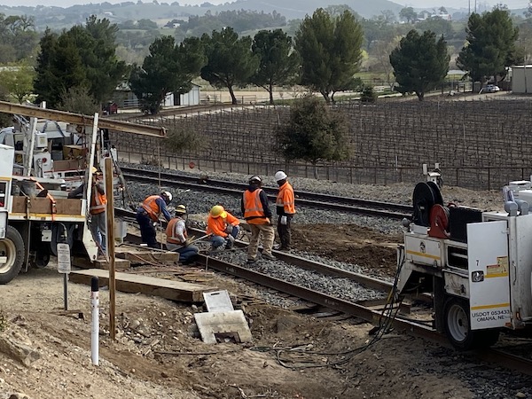 Workers up close railway road closure