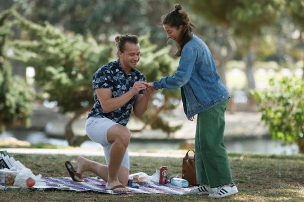 Local man celebrating college graduation, engagement