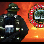 Early-morning vegetation fire contained in riverbed