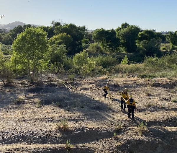 Fire extinguished in river bed Friday evening