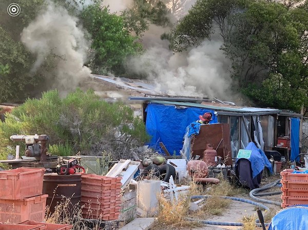 Structure used for gunsmithing and ammunition storage catches fire in Atascadero