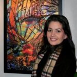 The artist Deprise with her award winning work, The Watcher.