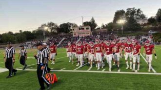 Bearcats leaving field at halftime