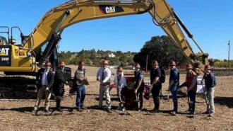 apartment complex breaks ground