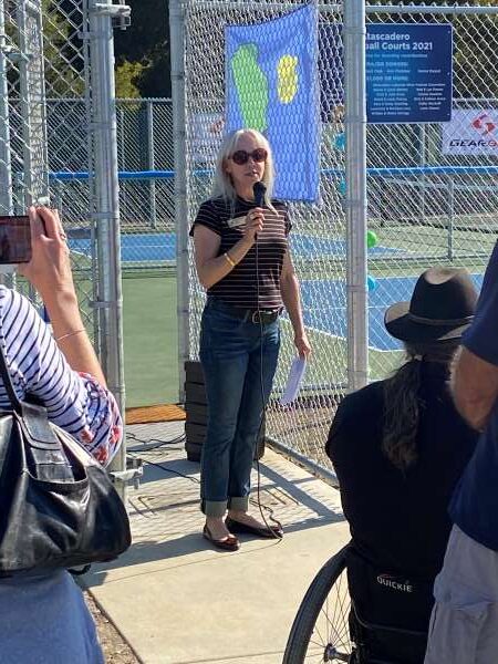 Heather talks near courts