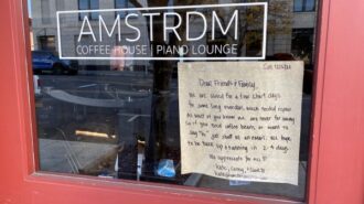 Amstrdm Sign on door