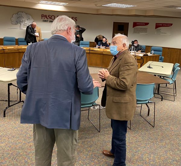 Dr. Dubost chats with Frank Triggs after selection
