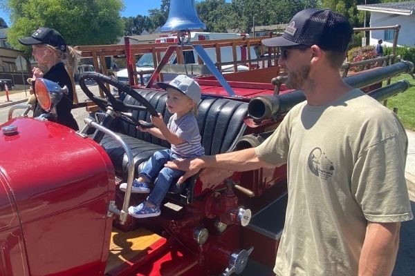 Bowain dad and kids on truck