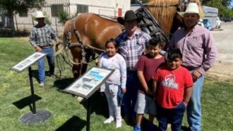 Tommy Harris and kids with crew