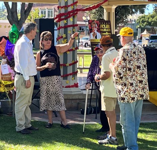Dahlen speaking with mayor Steve Martin