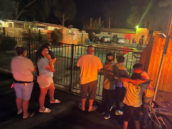 crowds looking at accident