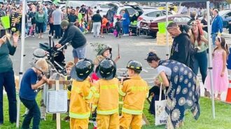 kids dressed as firemen