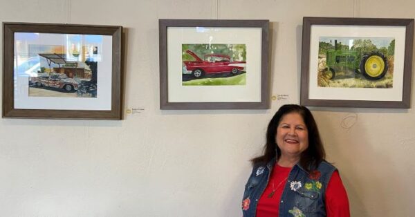 Dasiy Witcosky with classic vehicles