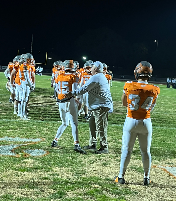 Coach Vic Cooper on the field.