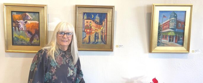 Margrete Koreska with her paintings
