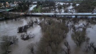 Flooded River Road under the Highway 46 overpass. Photo by Damien Marquez.