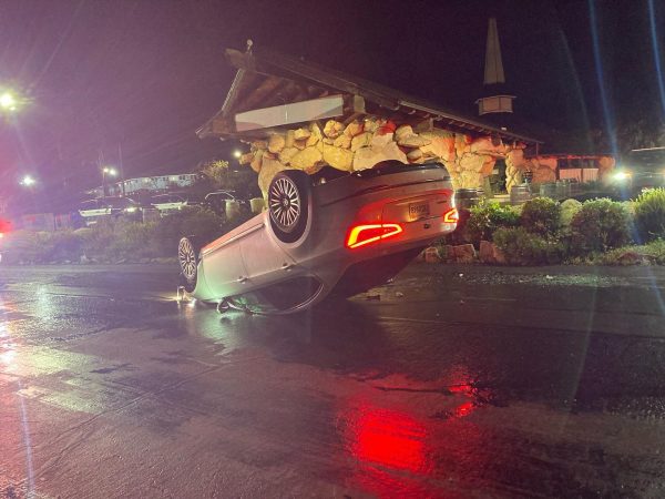 Car flips in Madonna Inn driveway Sunday night.