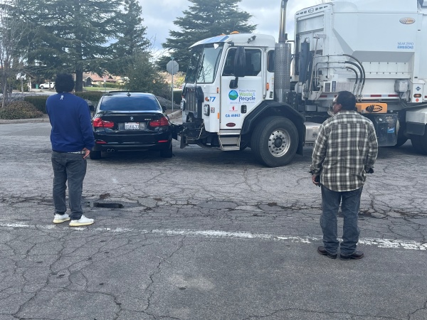 Garbage Truck and BMW