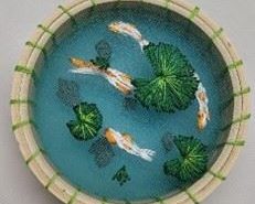 Craft a three-dimensional embroidered koi pond with the library