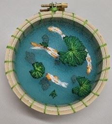 Craft a three-dimensional embroidered koi pond with the library