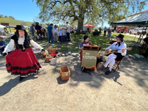Dancer dances while Los Californios play