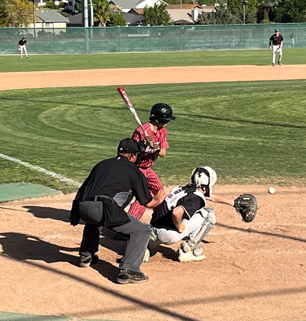 Zane Canaday takes an outside pitch.