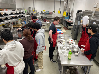 High school culinary students cater Rotary Club meeting