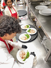 High school culinary students cater Rotary Club meeting