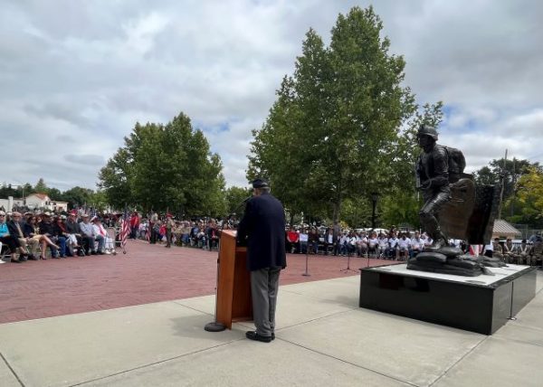 Commander David Brooks speaks to crowd
