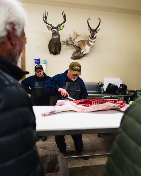 The Christensens teaching the Home Butcher Class at Oak Stone Meat Processing.