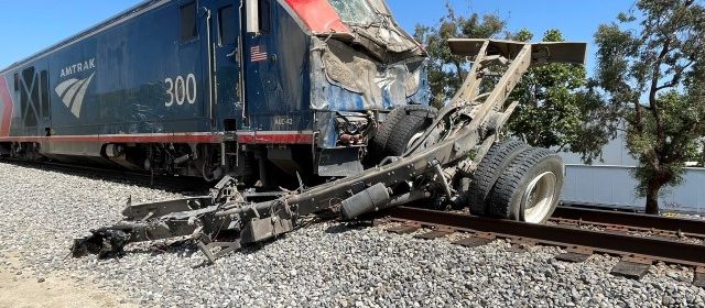 Amtrak train collides with work truck, 15 injured