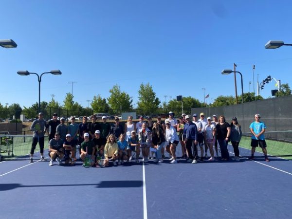 Tennis social event supports scholarships for local students