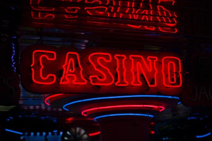 https://unsplash.com/photos/red-casino-neon-sign-turned-on-bYtIpXnzsQM