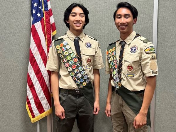 Damian Marano and Sebastian Marano take their first photo together as Eagle Scouts