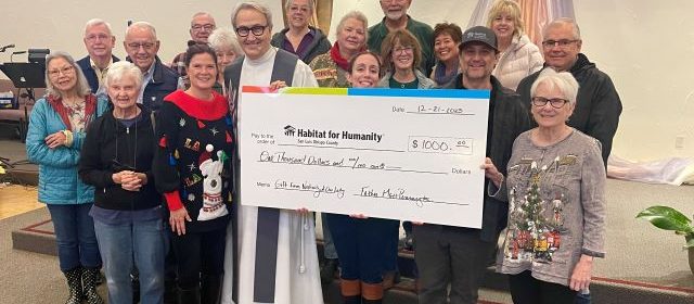 Local Catholic church donates to Habitat for Humanity