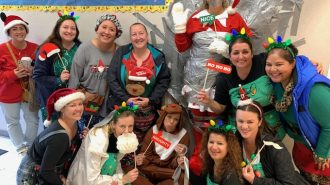 Elementary school celebrates last day before winter break with elfin mischief