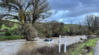 Two rescued from submerged vehicle in North County creek