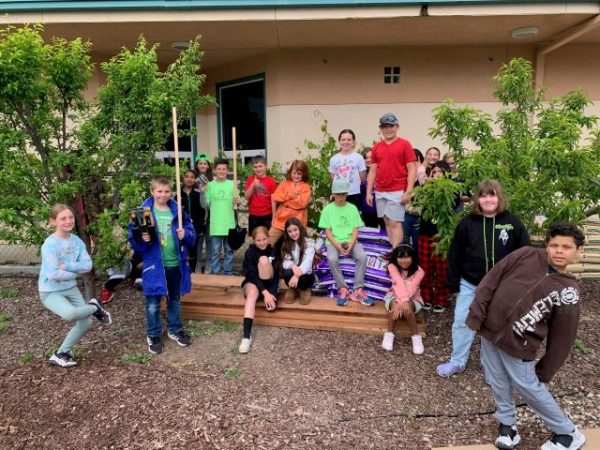 Lumber company delivers garden kits to schools