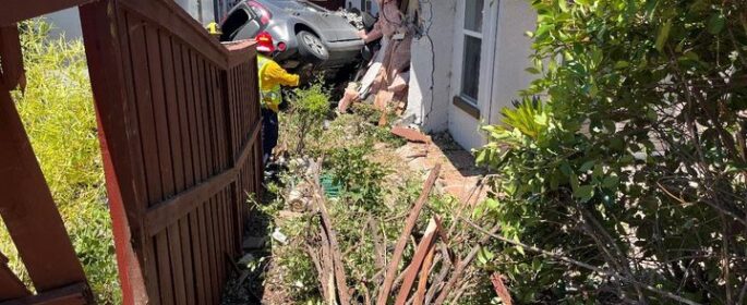 Driver rescued after crashing into Paso Robles house