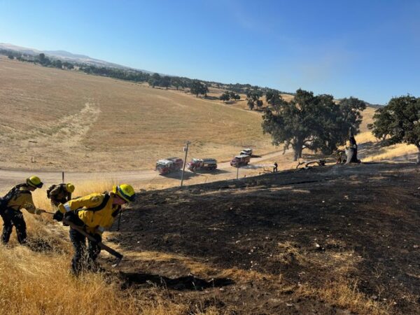 Local ranchers assist fire crews containing brush fire Friday