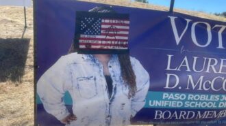 Vandal defaces campaign sign with hateful rhetoric, symbols