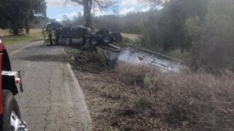 truck overturns chimney rock road
