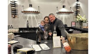 Rockbound Cellars’ Proprietors Fiorella and Colby DeRodeff with their son Felix at the tasting room