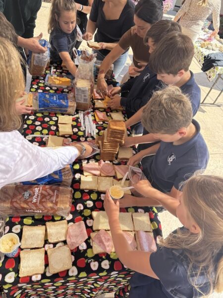 Mrs. Glunz's fourth grade class prepare 100 sandwiches for Echo Homeless Shelter