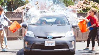 Youth soccer team holds community car wash